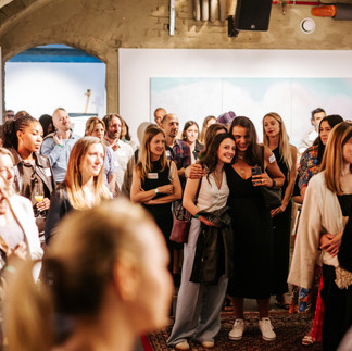 Parents gathered and engaged during the live auction at REAL Impact Night 2025.