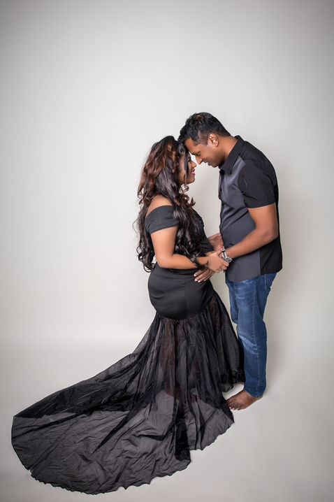 Maternity photoshoot Singapore couple black outfit studio pregnancy shoot