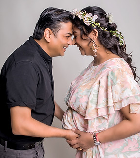 Maternity photoshoot Singapore couple studio pregnancy portrait