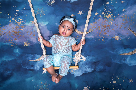 Milestone photoshoot Singapore baby girl swing moon fantasy theme