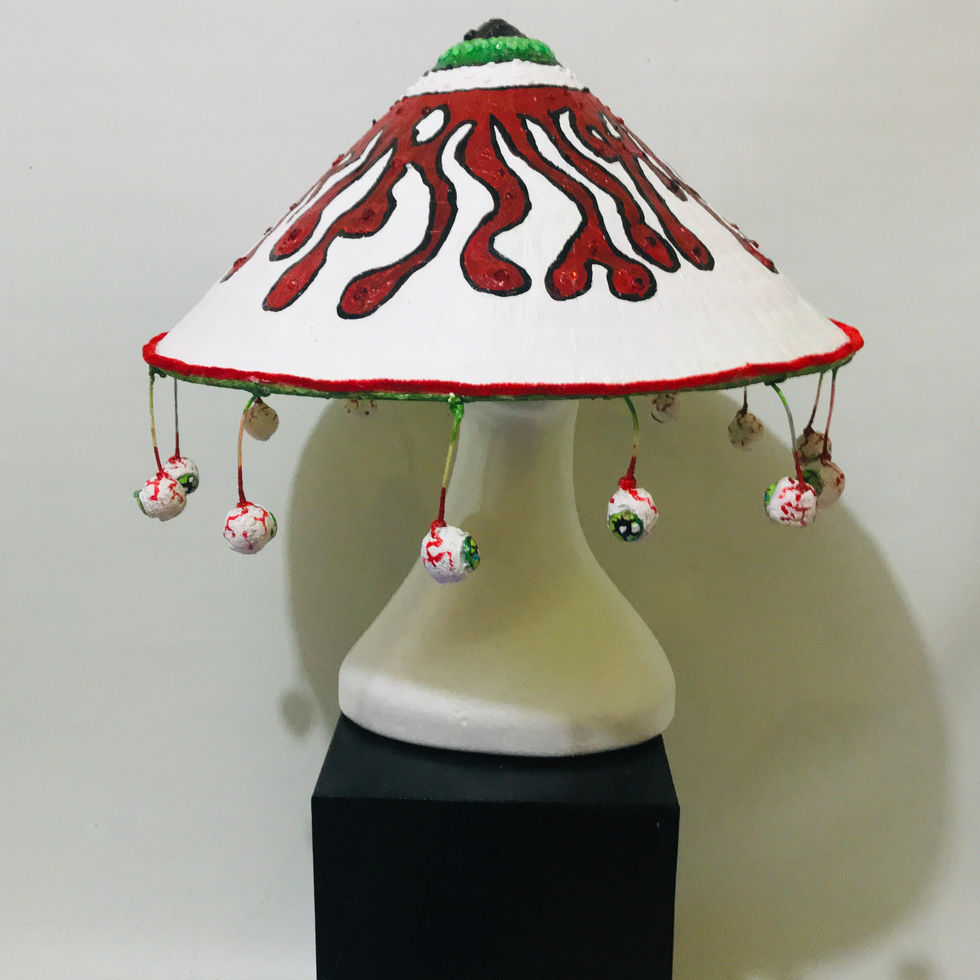 a lamp with a red and white design on it
