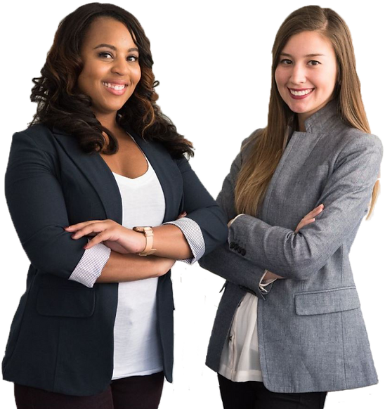 Two professional women dressed in appropirte attire.