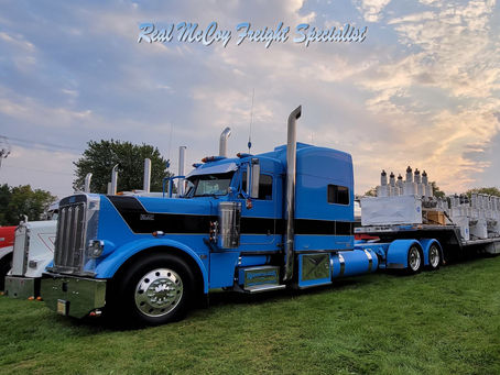 Low profile tri-axle step deck at the Big Iron Classic.