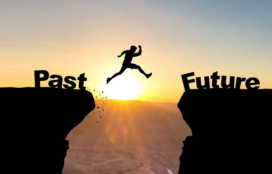 Man jumping over abyss with text Past/Fu