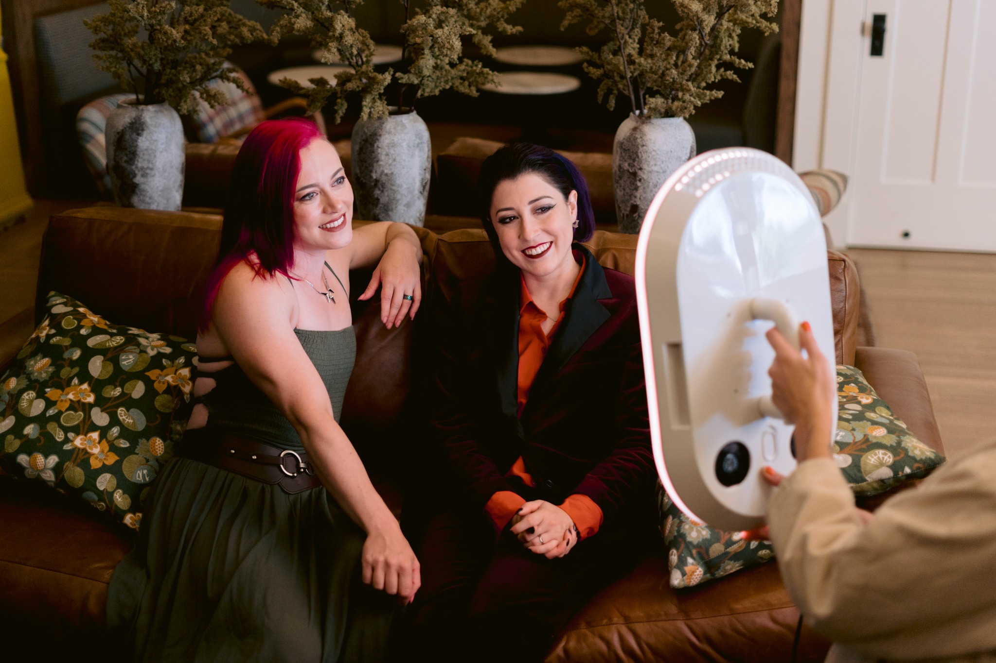 Guests using the Salsa 2 photo booth at a branded Bay Area event