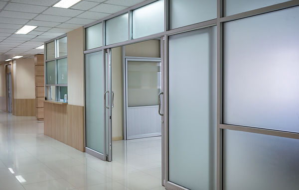 empty-hospital-corridor-open-door-ward.jpg