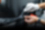car-wrapping-specialist-putting-vinyl-foil-film-car-selective-focus (5).jpg