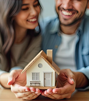 happy-young-couple-holding-model-house-celebrating-new-home-ownership-buying-new-house.jpg