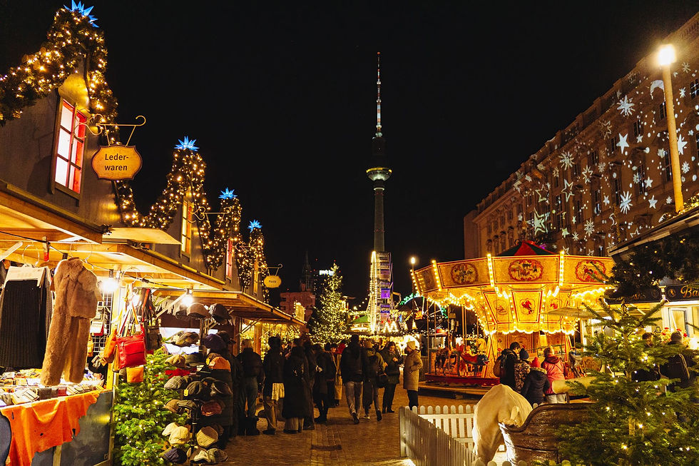 Festive Christmas market at night with illuminated wooden stalls and fairy lights in Berlin, Germany – Christmas markets cruise inspiration