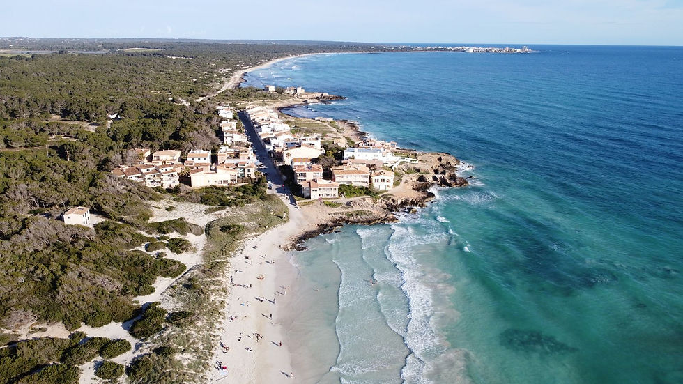 Aerial view of a Mallorca beach and turquoise sea, a popular summer 2027 holiday destination from the UK