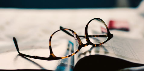 glasses on a magazine