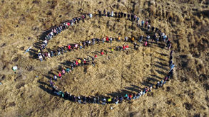 Cel mai mare logo din figuri umane 