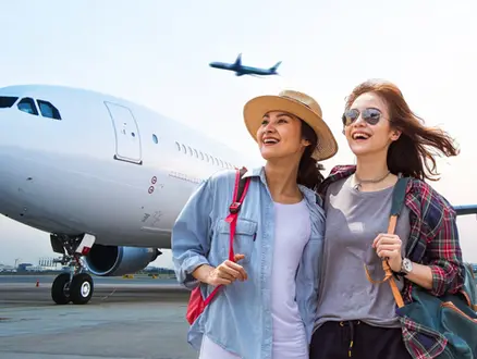 Asians at the hangar of the airport