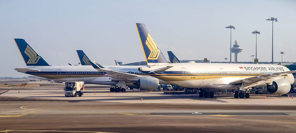 Singapore Airlines fleets parked at the runway