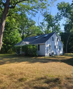Asphalt roof repair and skylight installation by roofing contractor in Hampton, NH.