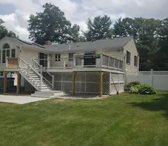 Roof and vinyl siding installation by exterior remodeling contractor in Kingston, NH.