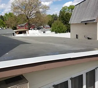 Commercial rubber roof installation by roofing contractor in Chelmsford, Middlesex County, MA.