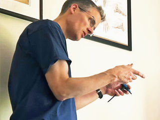Jake at Physio Fit Bristol assessing a client during a bike fit.