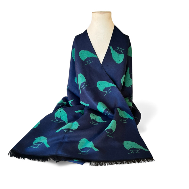Fashionable reversible robin scarf with fringed edges, perfect for layering and everyday wear