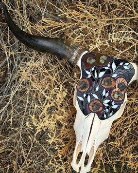 Mosaic cow skull art