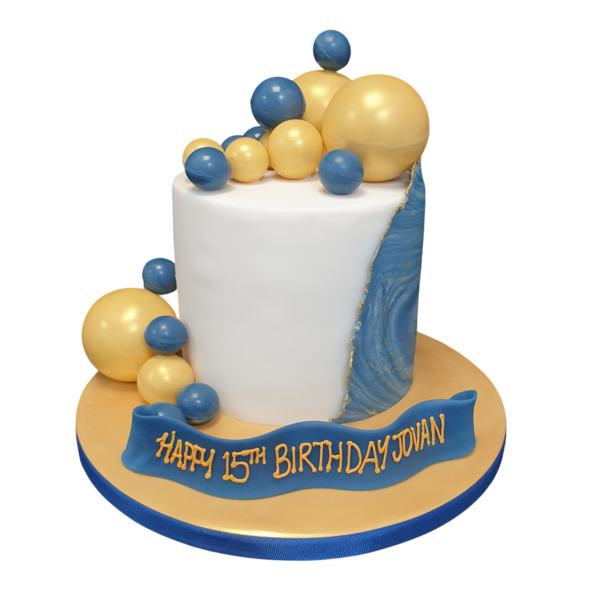 A stunning cake decorated with marbled fondant icing and edible spheres, perfect for special occasions in UK.