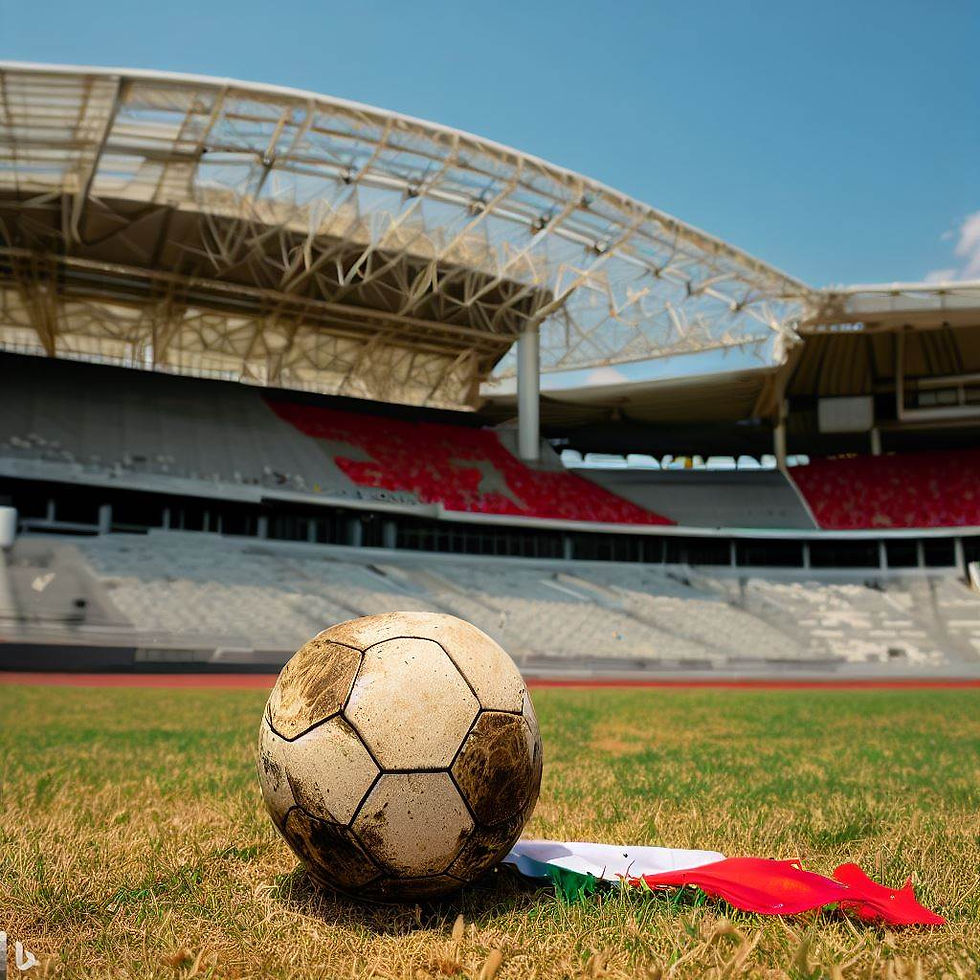 Bola desgastada sobre uma bandeira da Indonésia num estádio vazio de futebol.
