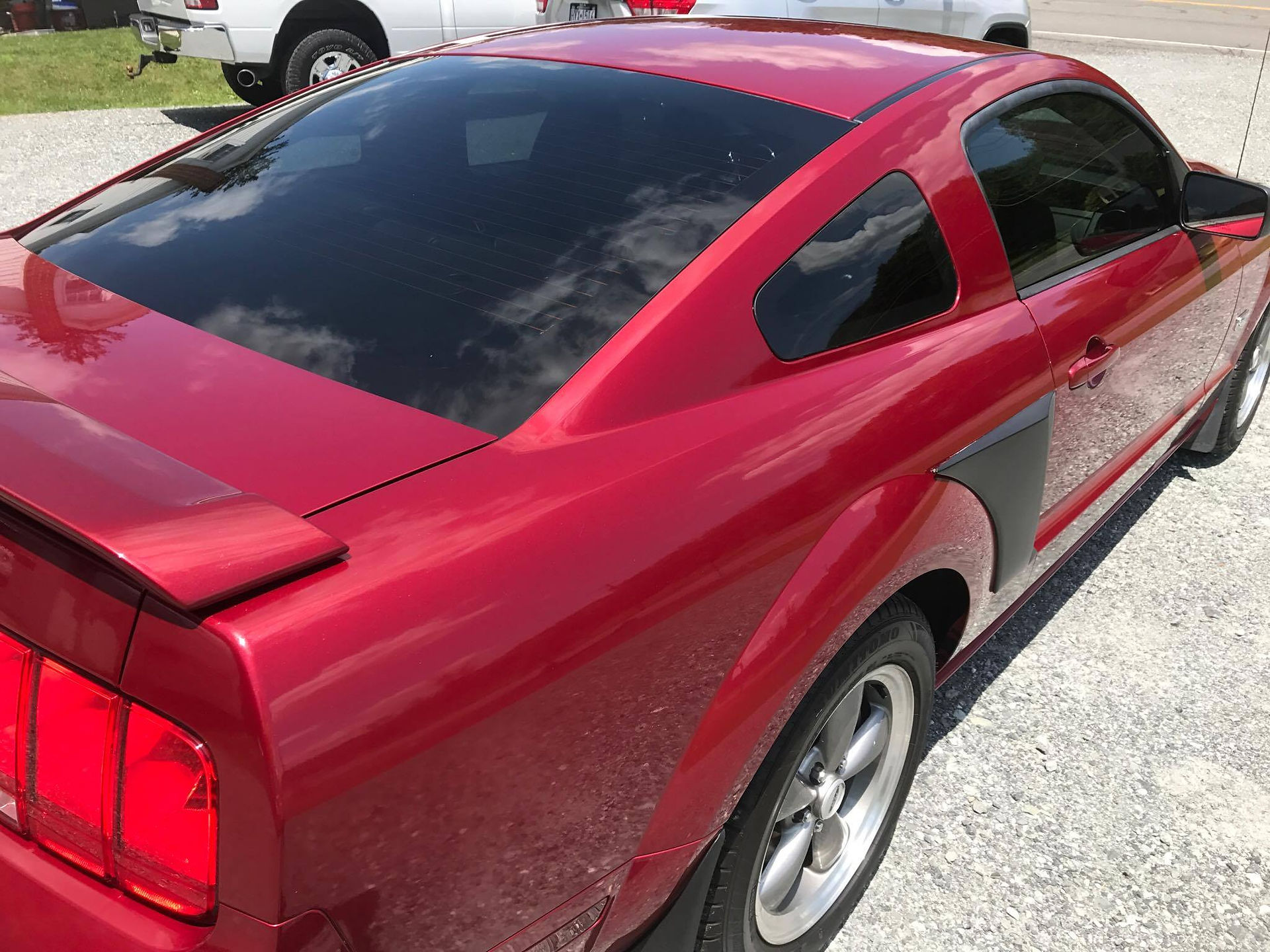 red mustang back view 2 with window tint