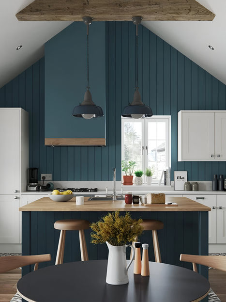 Two-tone shaker kitchen with Porcelain cabinets, Marine island, timber worktops, vaulted ceiling, and bench seating.