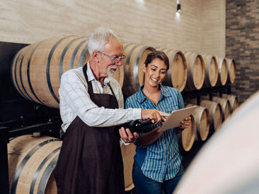 couple talking in winery