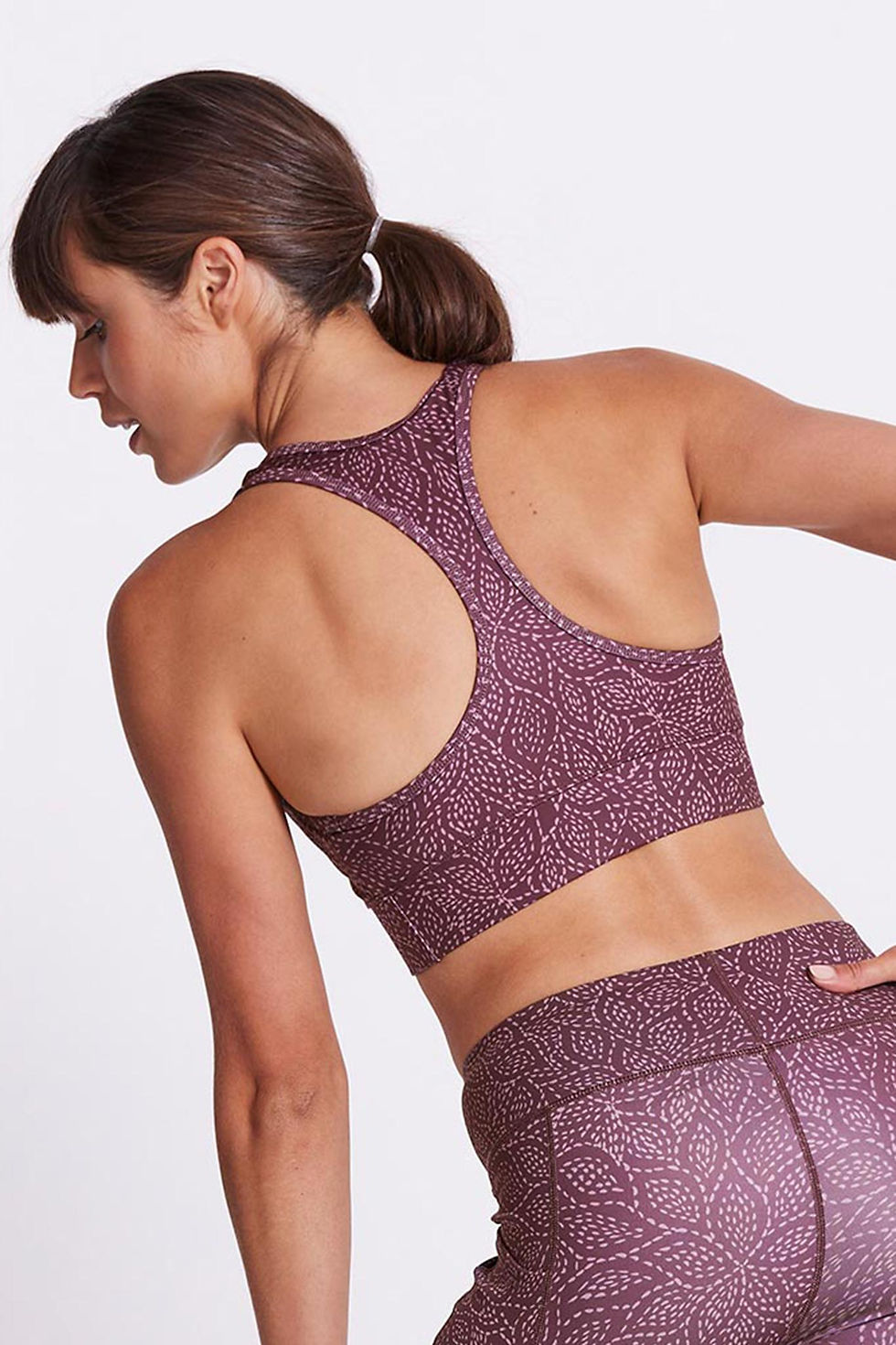 Racer back sports bra with removable padding offering high support