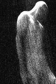 The high-contrast and granular textures evoke a sensation of atomic or quantum "noise", visualizing the idea that all matter is in constant flux at a microscopic level.