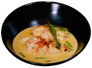 Pittige Groene Curry met kokosmelk, Thaise aubergine en verse kruiden bij The Thai Utrecht Oost.