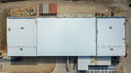 Full flat roofing system installed onto a new industry building. Materials used was 60 Mil TPO Roofing, mechanically adhered and fastened