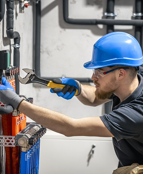 technician-checking-heating-system-boiler-room.jpg