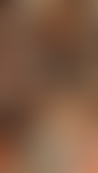 Small Spice Cakes Accompanied with Cream Cheese Frosting and Candied Pecans