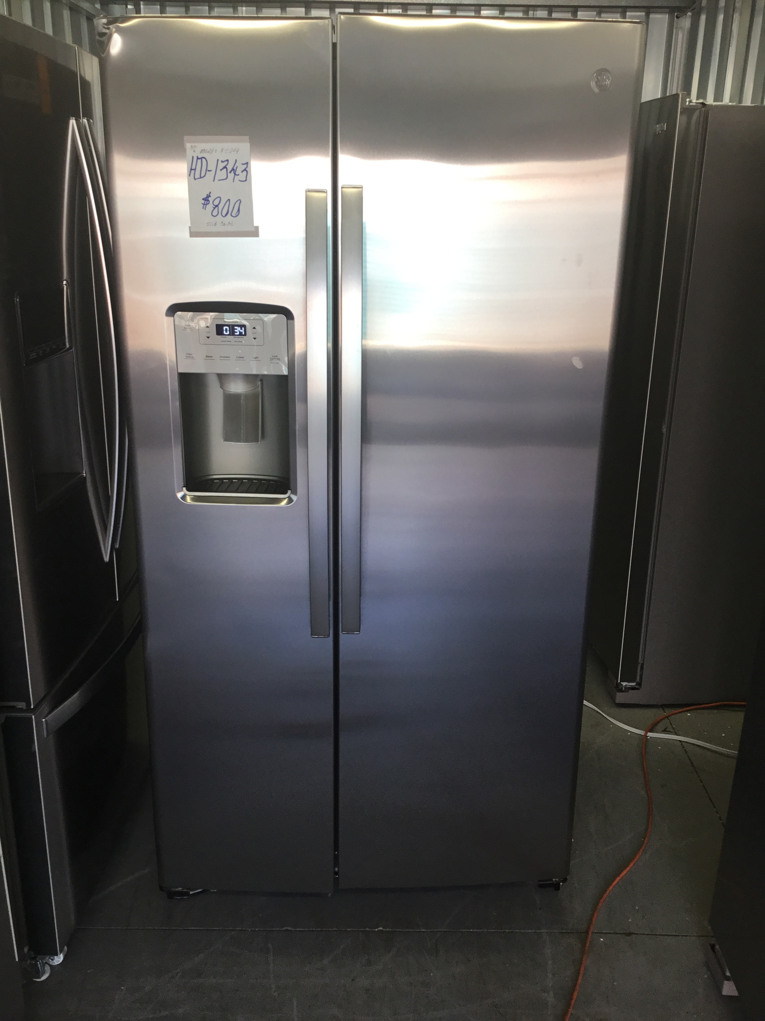 1342.....GE 21.8 Cu. Ft. Counter-Depth Side-By-Side Refrigerator in Stainless