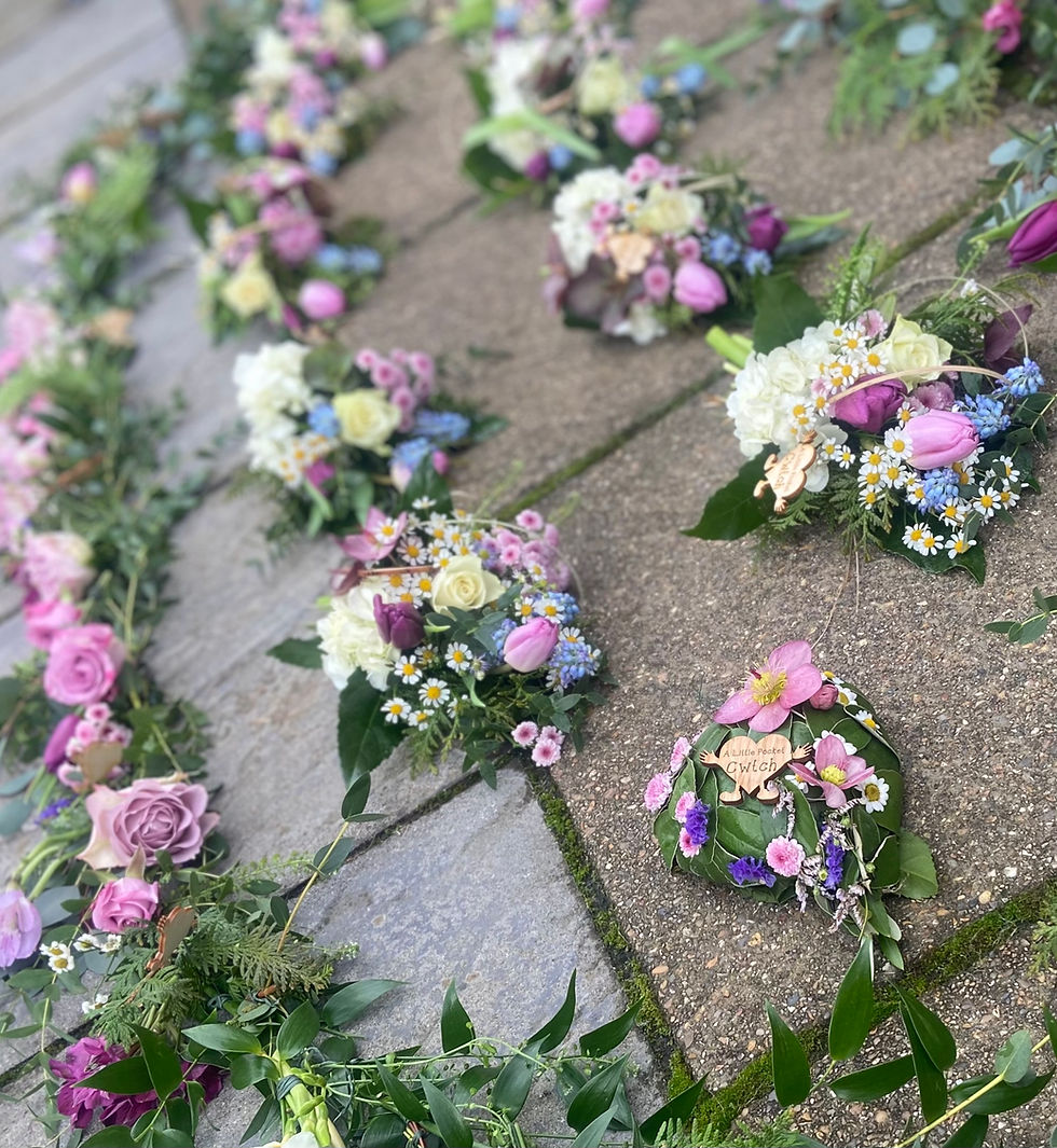 Thumbnail: Willow Casket Garland with matching flower spray .