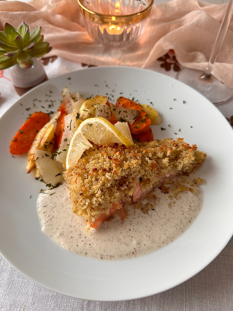 Romantic date night dinner at home with elevated meal and cozy table setting