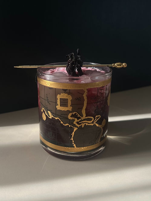 Hibiscus margarita cocktail in a lowball glass with ice, garnished and photographed for a relaxed at-home date night.