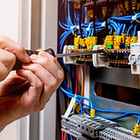 jacksonville electrician working on a breaker