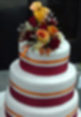 Orange and red wedding cake