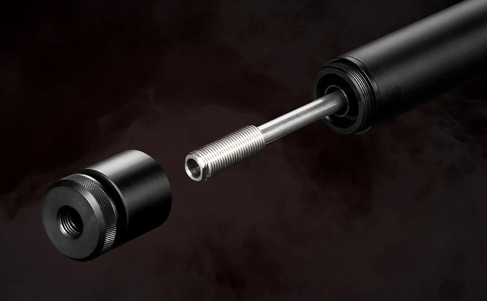 Black cylindrical mechanical parts separated by a silver threaded rod on a dark smoky background