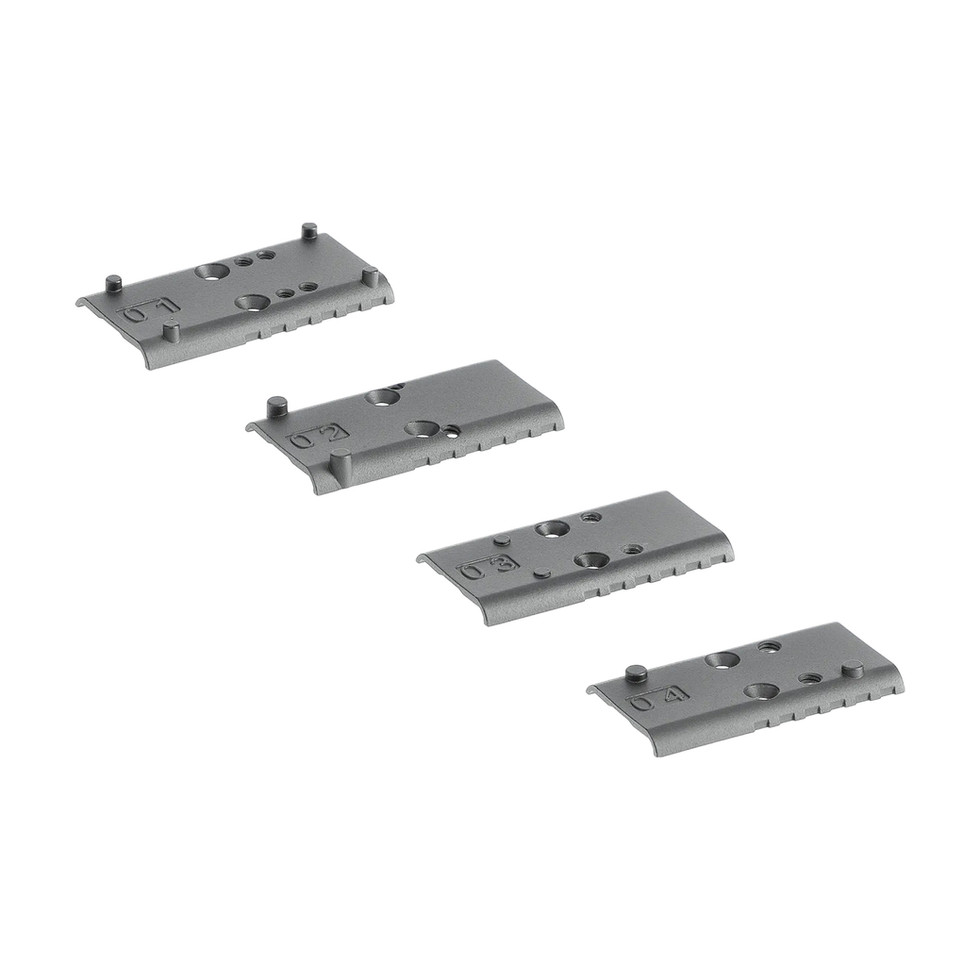 Four gray metal plates, various sizes