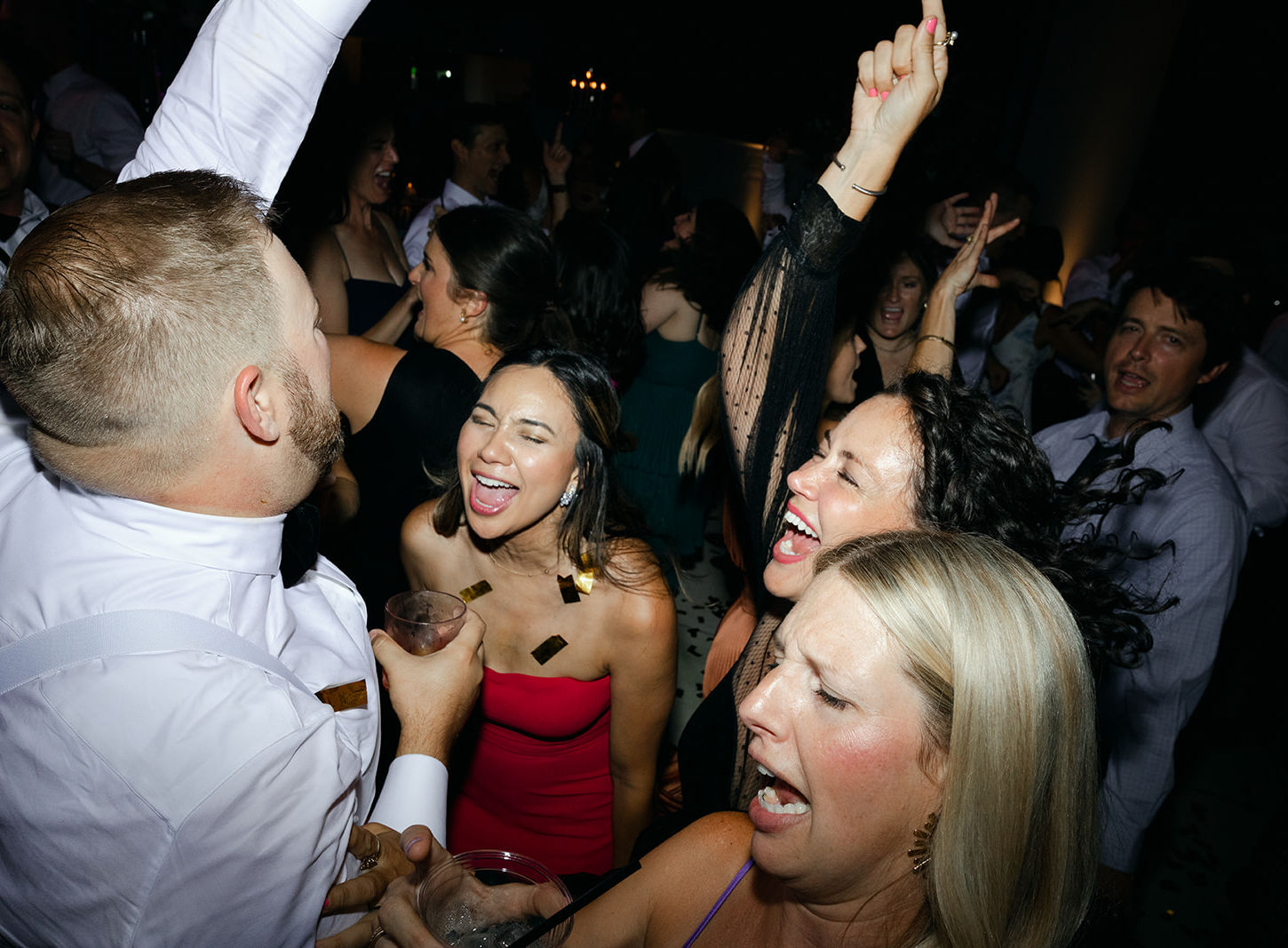 3 girls and one guy dancing and singing