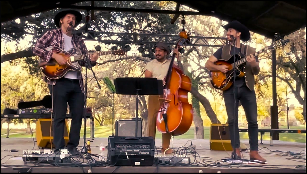 Pendulum Hearts playing on a stage outside