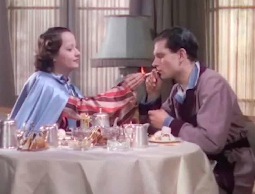 Merle Oberon and Laurence Olivier in "The Divorce of Lady X" (1938)