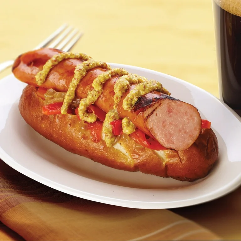 Air Fryer Hillshire Farm Beef Hot Links Smoked Sausage on a plate with mustard