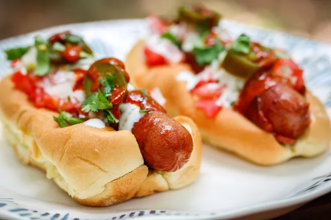 Air Fryer Oscar Mayer Chili Cheese Stuffed Hot Dogs up close on a plate