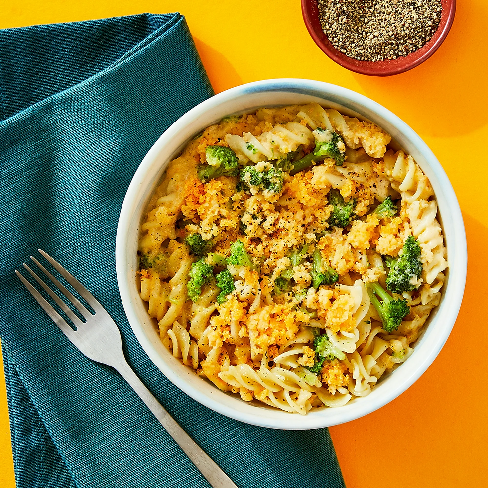 Air Fryer BetterGoods Broccoli Cheddar Bake in a bowl with a fork next to it