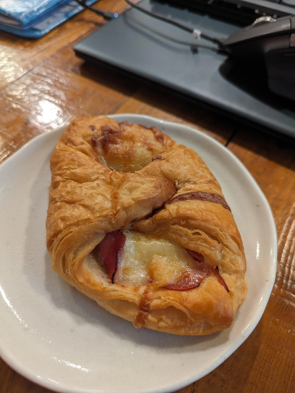 Air Fryer La Boulangerie Ham & Swiss Cheese Croissant Sandwich on a plate